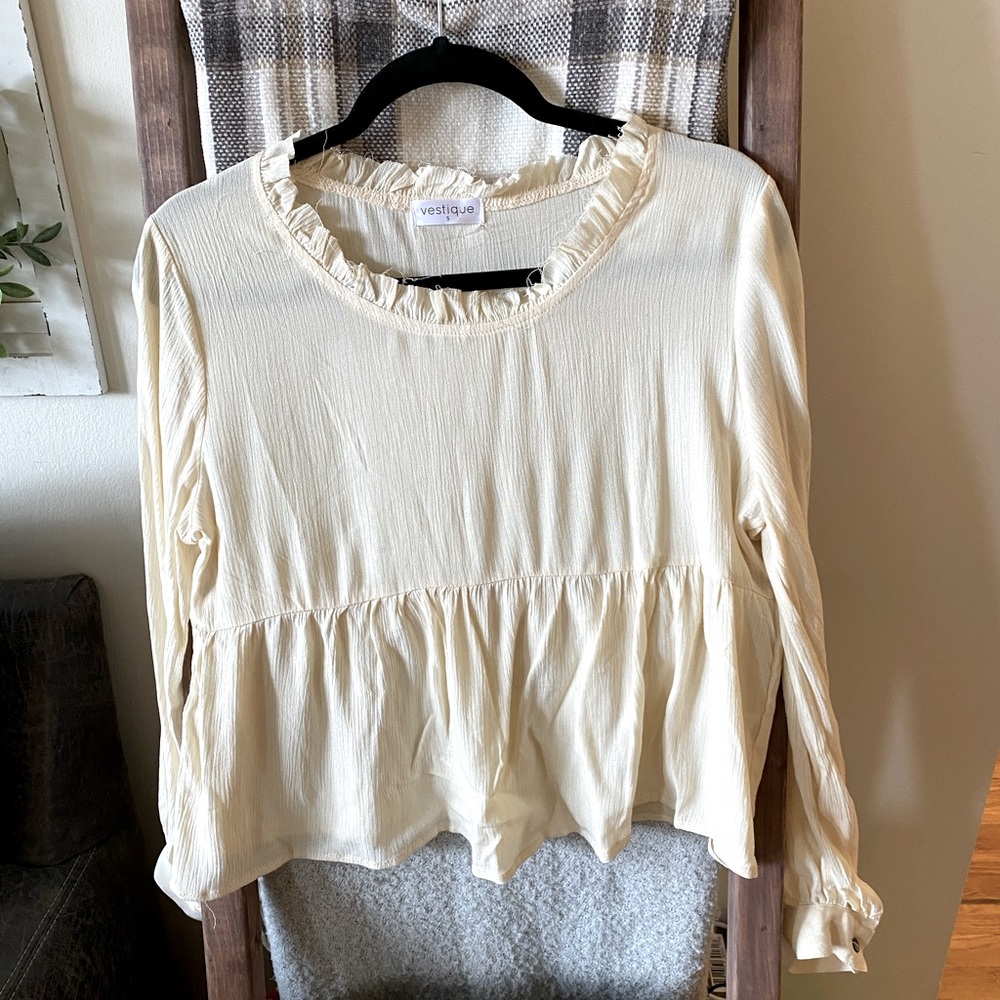 Vestique Small ruffled peplum blouse